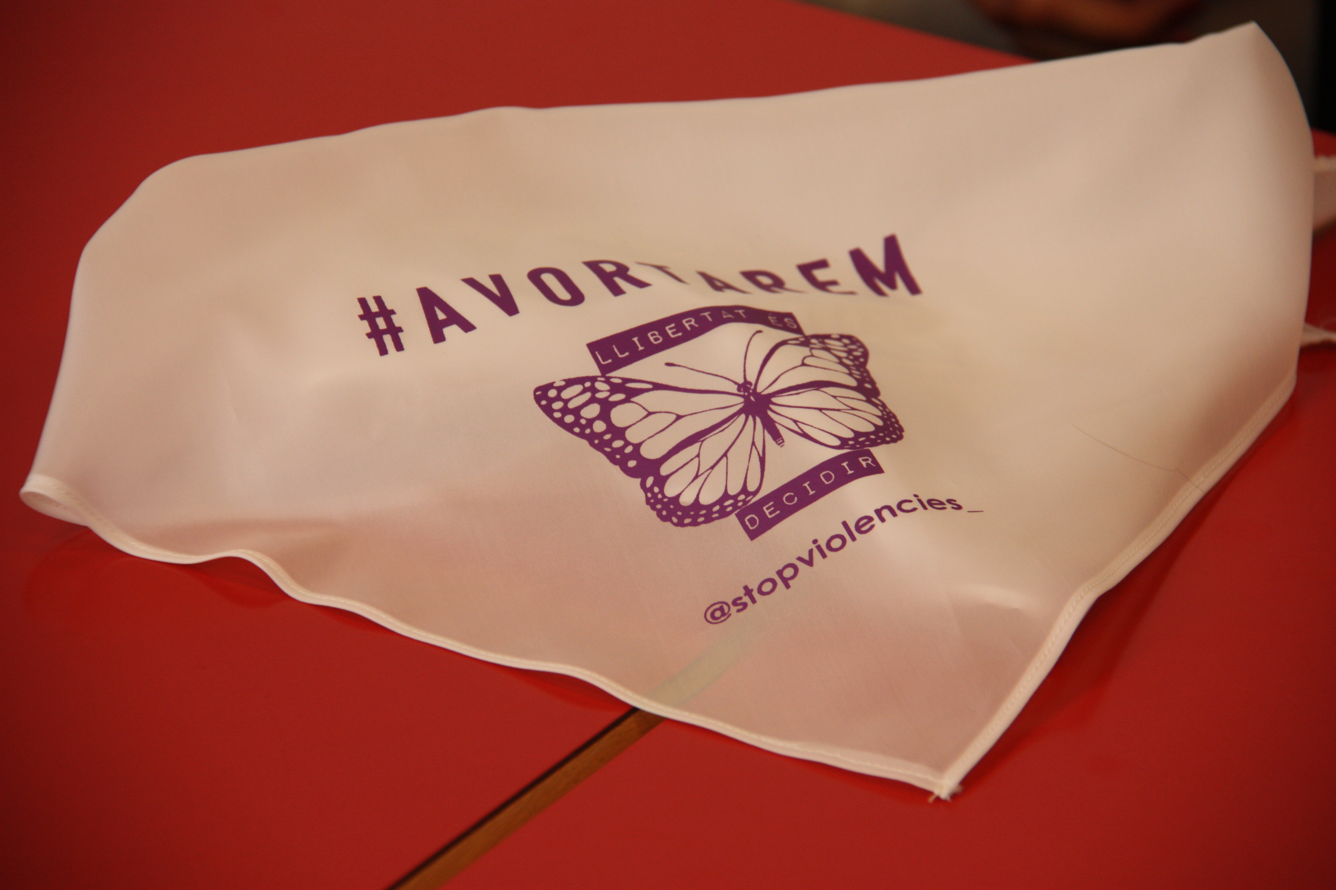 Stop Violències handkerchief with 'Avortarem' (We will abort) slogan demanding the legalization of abortion in Andorra (by Albert Lijarcio)